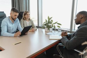 A business team reviewing workplace policies in an office