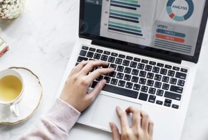 Lender's website being checked on a laptop
